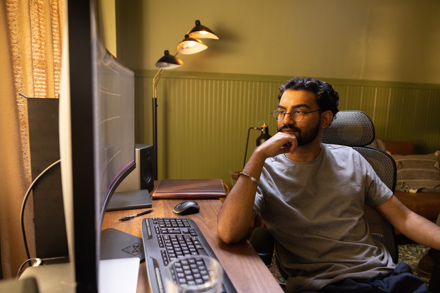 A man looking at a computer.